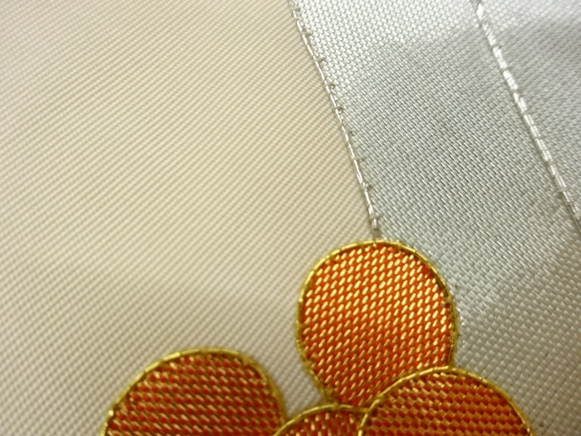  塩瀬金銀駒刺繍万年青模様名古屋帯